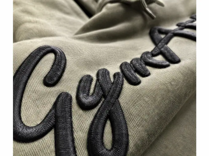 3D Puff branding on activewear, applied in-house at the Eliian factory