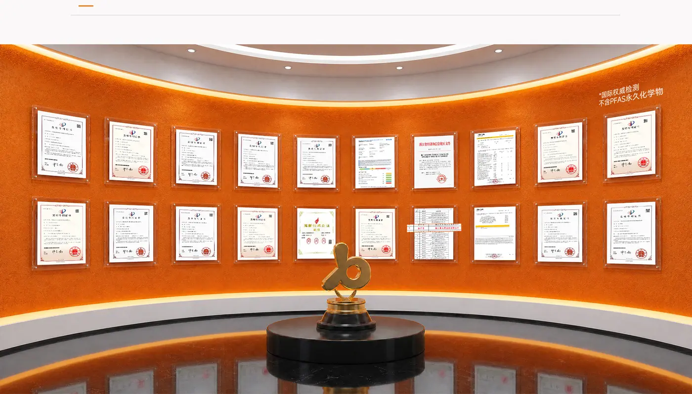 The certificate wall in the Eliian showroom — patents, test reports and corporate honours on display