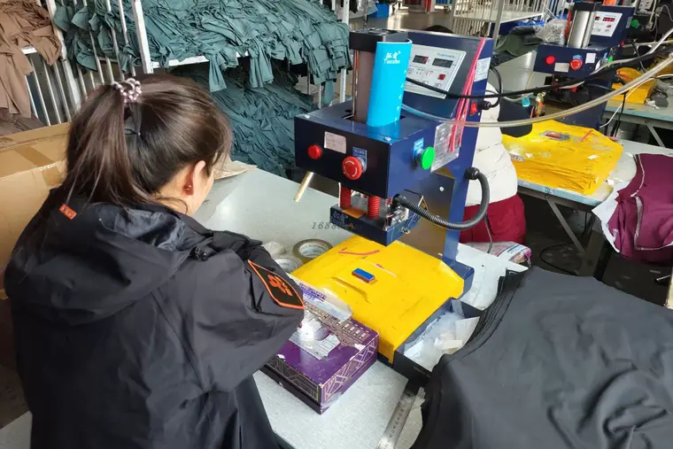 Finishing & pressing — Eliian activewear factory, Xiamen